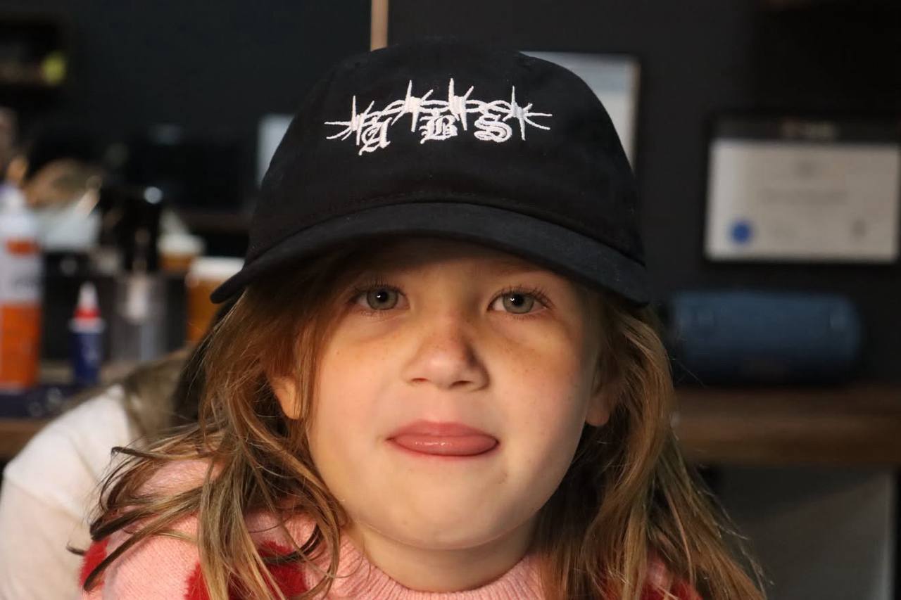 ABS youth shirt, worn by a young member of the crew